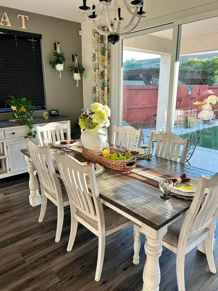 Dining table set and cleaned beside patio doors